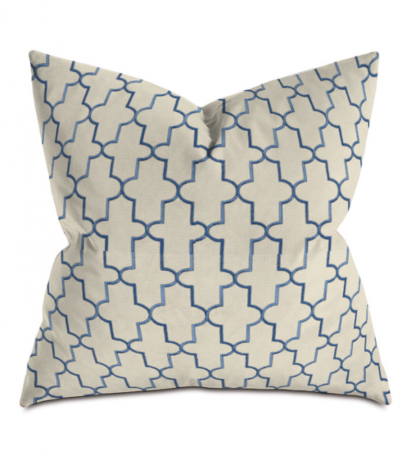 beige and blue cross embroidered throw pillow